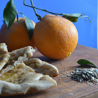 ricetta Schiacciata al profumo di arancia e semi mediterranei