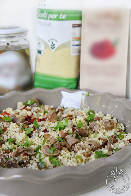 Cous Cous Con Pancetta, Funghi Piselli E Peperone In Fiocchi