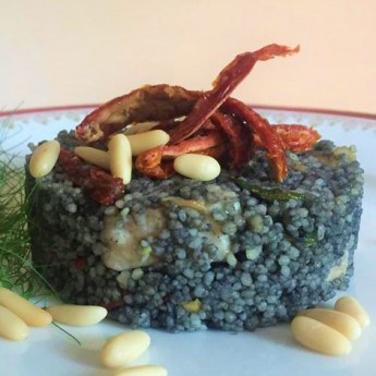 ricetta Cous cous al nero di seppia, pesce spada e pomodori secchi